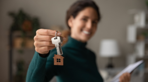 Realtor handing over key